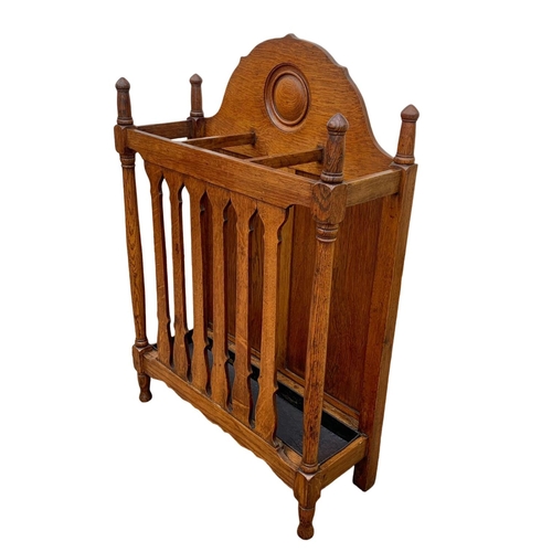 1006 - A late Victorian oak umbrella stick stand. Circa 1890/1900. 61.5 x 22.5 x 91cm.