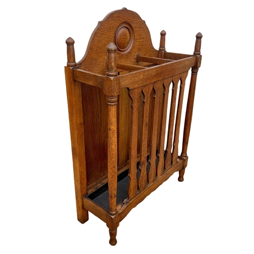 1006 - A late Victorian oak umbrella stick stand. Circa 1890/1900. 61.5 x 22.5 x 91cm.