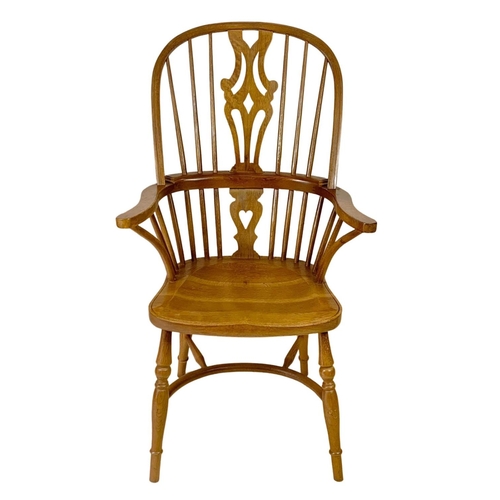 1016 - Large 19th century style oak Windsor armchair. 66 x 62 x 114cm