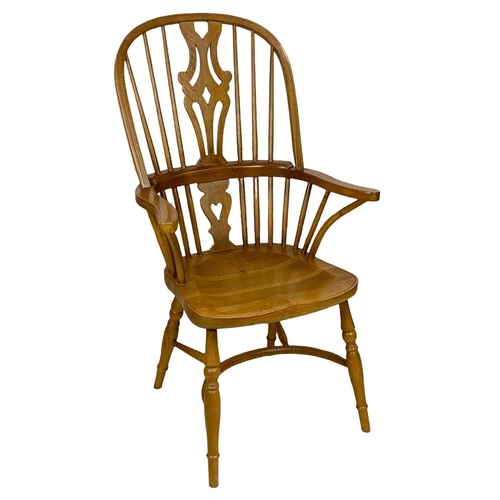 1016 - Large 19th century style oak Windsor armchair. 66 x 62 x 114cm