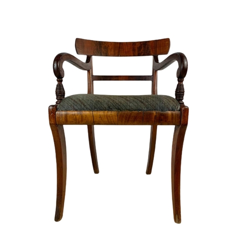 982 - Early 19th century Regency mahogany armchair with sabre legs.