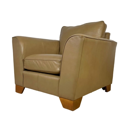 797 - A large leather armchair. 101 x 101 x 90cm.