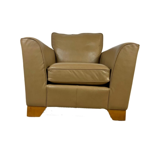 797 - A large leather armchair. 101 x 101 x 90cm.