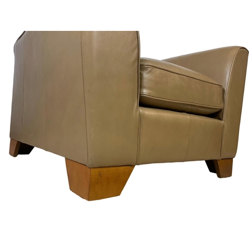 797 - A large leather armchair. 101 x 101 x 90cm.