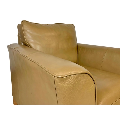 797 - A large leather armchair. 101 x 101 x 90cm.