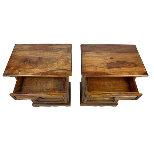 1039 - A pair of rosewood bedside cabinets with drawer. 49 x 34 x 69cm.