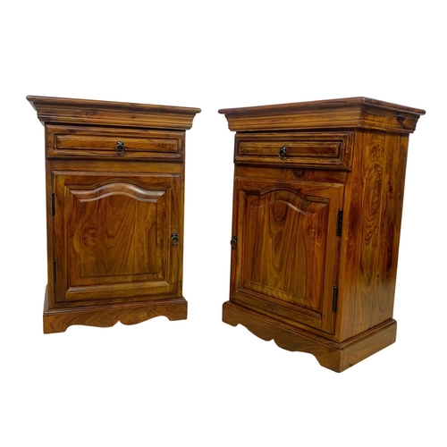 1039 - A pair of rosewood bedside cabinets with drawer. 49 x 34 x 69cm.