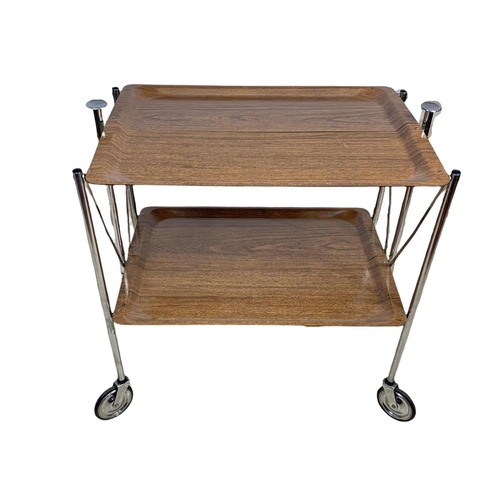 994 - A folding 2 tier chrome and laminate serving trolley. Mid century. Circa 1970. 65 x 42 x 70.5cm.