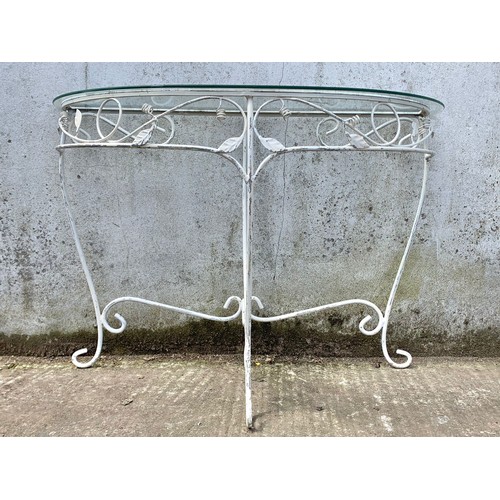 1038 - A French glass top console table. 101 x 40 x 71cm.