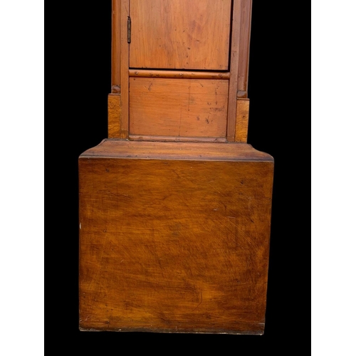 1007 - A Victorian mahogany long case clock with weights 221cm.