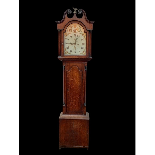 1008 - A Victorian oak long case clock with weights. 204cm.