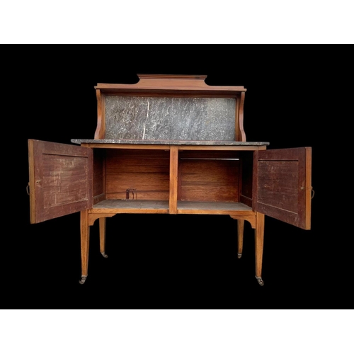 1010 - An Edwardian inlaid mahogany marble top washstand. 106.5 x 45 x 127cm.