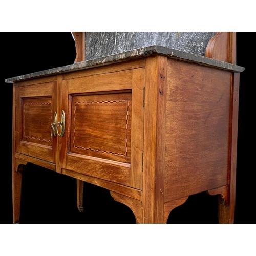 1010 - An Edwardian inlaid mahogany marble top washstand. 106.5 x 45 x 127cm.