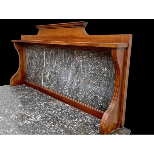 1010 - An Edwardian inlaid mahogany marble top washstand. 106.5 x 45 x 127cm.