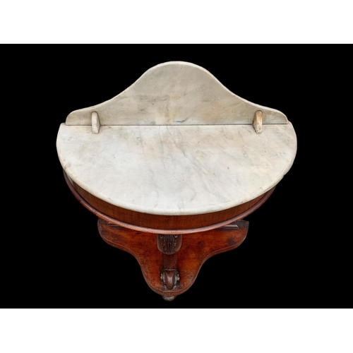 1013 - A Victorian mahogany marble top washstand. Circa 1870. 91.5 x 46 x 97.5cm.