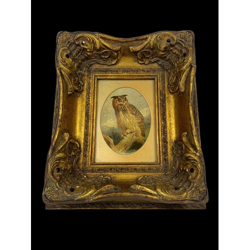 102 - An ornate gilt framed print. Frame from Carvers & Gilders Picture Makers & Restorers. 27 x 32cm.