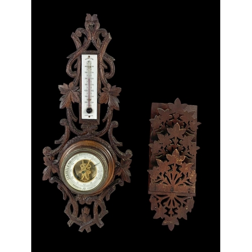 105 - A late 19th century barometer and letter rack. Barometer measures 46cm.