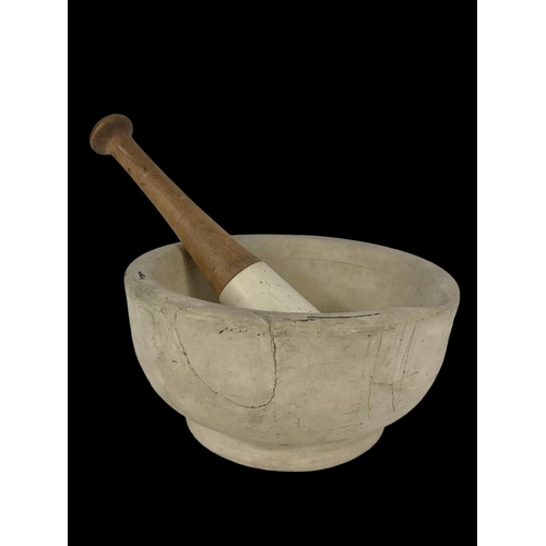 12 - A large mortar and pestle. 21 x 21 x 11cm.