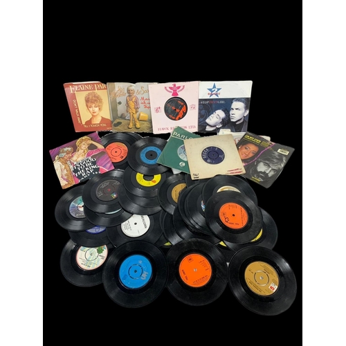 140 - A collection of 45 single records. The Boomtown Rats, The Beatles, The Rolling Stones, Paul McCartne... 