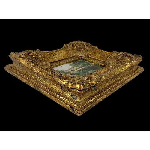 150 - An ornate gilt framed oleograph. 35.5 x 7 x 30.5cm.