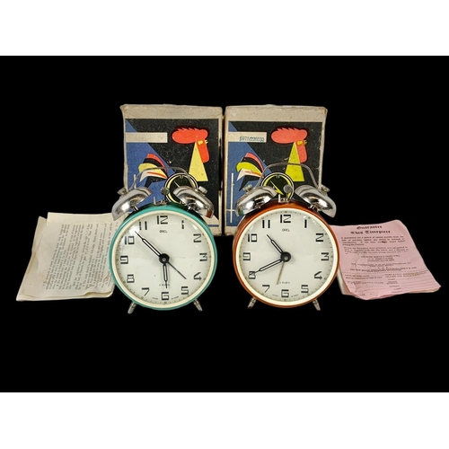 155 - 2 vintage Orel alarm clocks in boxes.