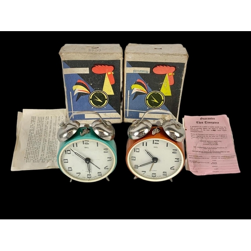 155 - 2 vintage Orel alarm clocks in boxes.