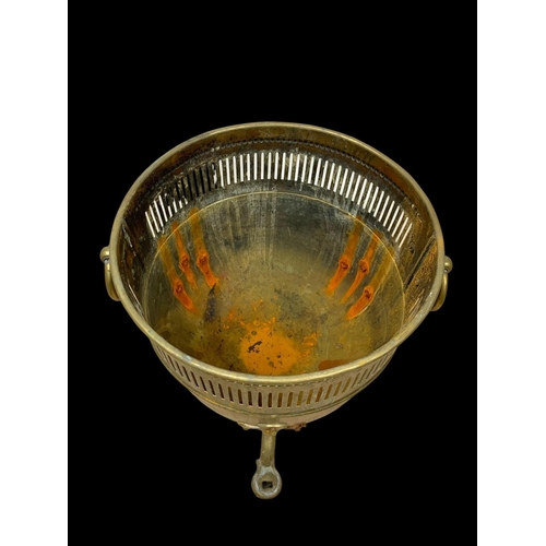 17 - A Victorian brass coal bucket with lid and 2 ring handles. 37 x 34 x 52cm.