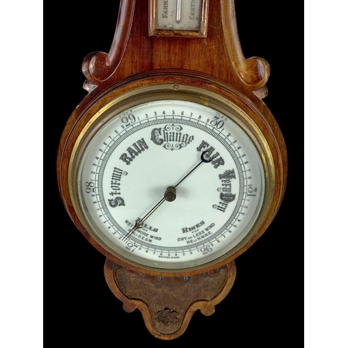 31 - A Edwardian mahogany barometer. 81cm.