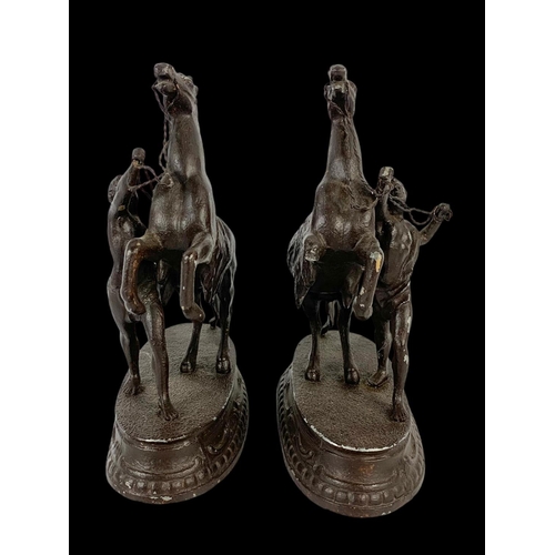 32 - A pair of early 20th century spelter Marley Horse figures. Circa 1900. 18 x 22cm.