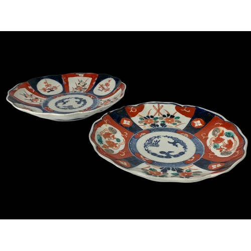 395 - 2 19th century Imari plates. 22cm.