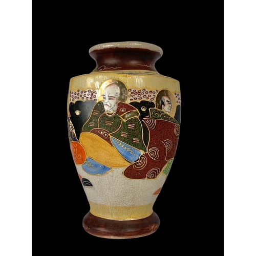 399 - An early 20th century Japanese Satsuma vase. Circa 1900-1920. 24cm.