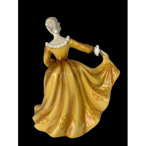 402 - A Royal Doulton porcelain figurine “Kirsty” 20cm.