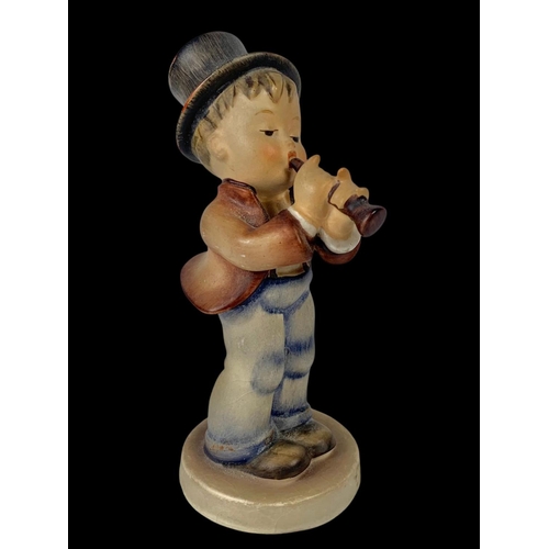 405 - A vintage M. J. Hummel Goebel pottery figure “Serenade” number 85/0. 12.5cm.