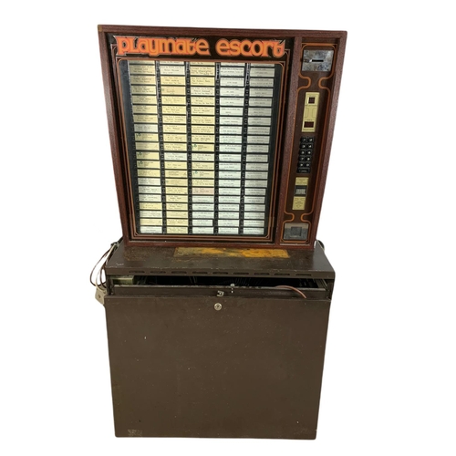 214 - Juke box with over 200 records, 70/53.5/129cm.