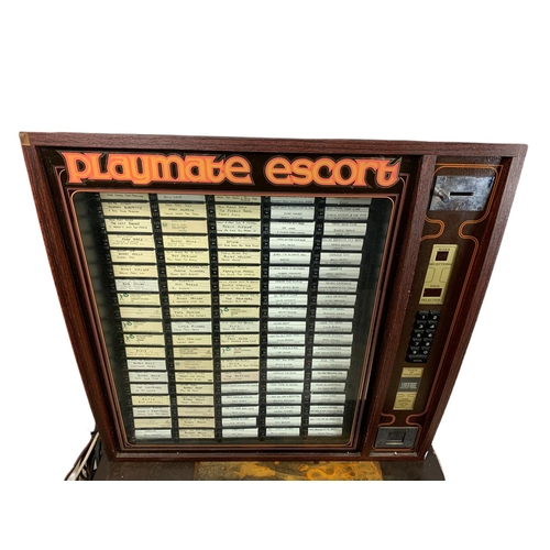 214 - Juke box with over 200 records, 70/53.5/129cm.