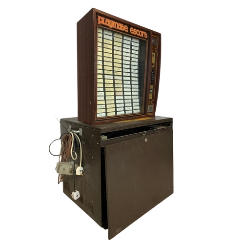 214 - Juke box with over 200 records, 70/53.5/129cm.