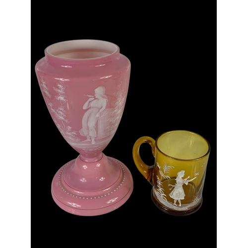 418 - A large Victorian Mary Gregory glass vase and a Mary Gregory glass mug. Vase measures 28cm.