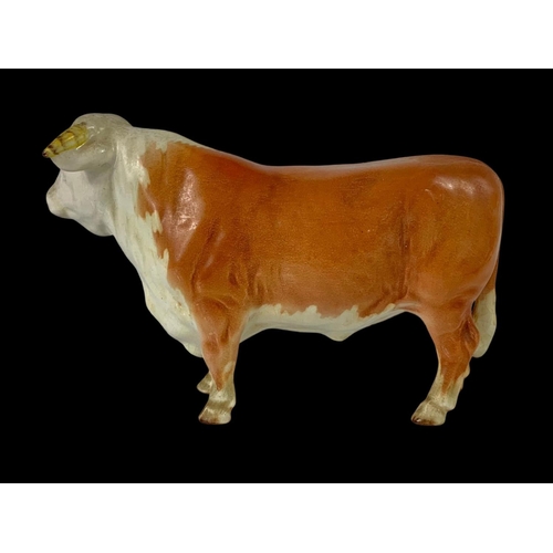 420 - A Large Beswick pottery bull. 23 x 15cm.