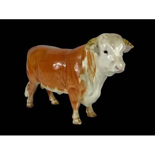 420 - A Large Beswick pottery bull. 23 x 15cm.