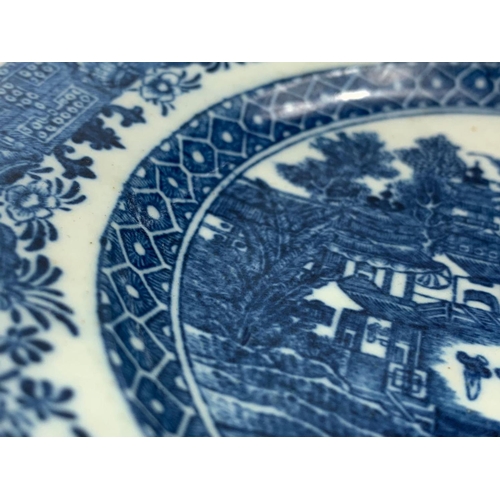 429 - An 18th century Caughley “Pagoda” pattern blue and white Chinese design porcelain plate. Circa 1785.... 