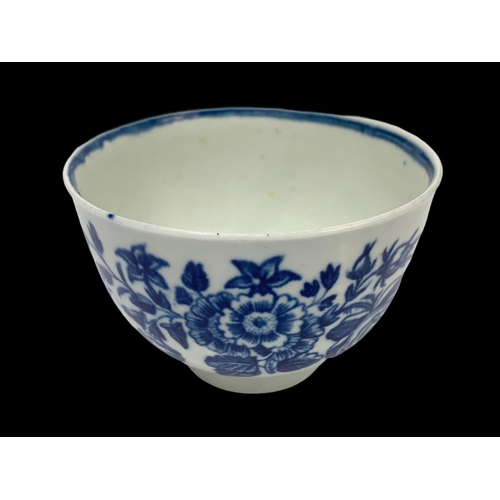 432 - An 18th century first period Worcester “Three Flowers” pattern blue and white Chinese design porcela... 