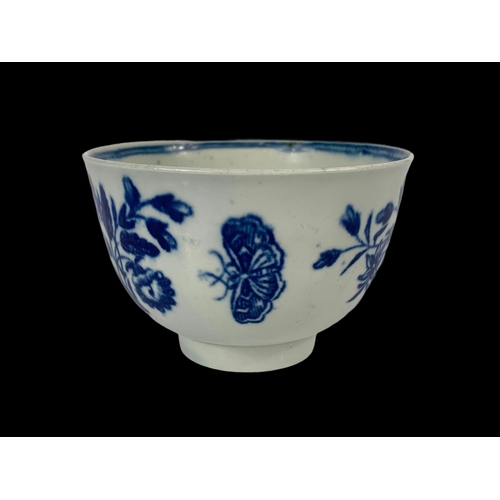 432 - An 18th century first period Worcester “Three Flowers” pattern blue and white Chinese design porcela... 