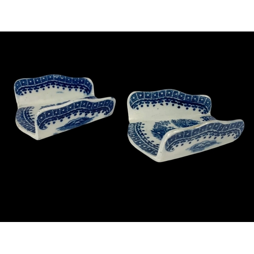 433 - A pair of 18th century Caughley “Fisherman” pattern blue and white Chinese design porcelain asparagu... 