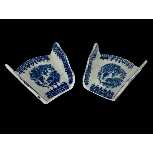 433 - A pair of 18th century Caughley “Fisherman” pattern blue and white Chinese design porcelain asparagu... 