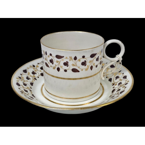 436 - An early 19th century Worcester Flight Barr & Barr brown vine pattern cup and saucer. Circa 1815.