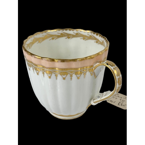 440 - An 18th century Crown Derby Puce mark cup and saucer. Circa 1795.