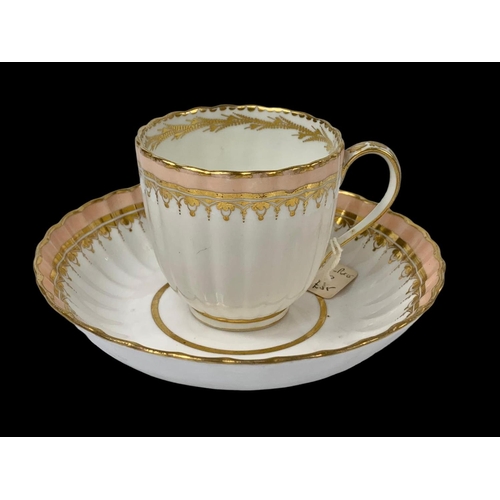 440 - An 18th century Crown Derby Puce mark cup and saucer. Circa 1795.