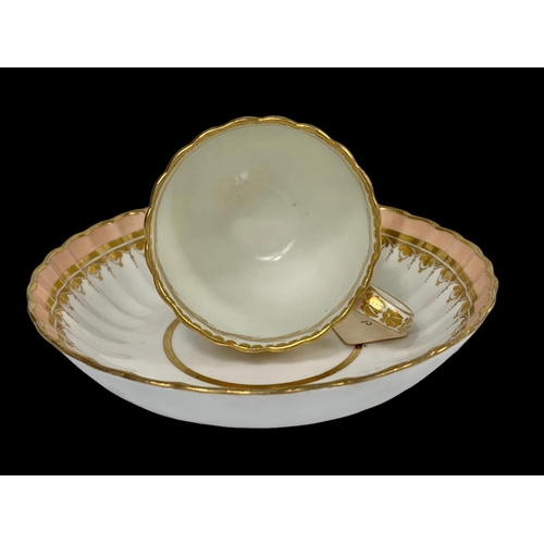 440 - An 18th century Crown Derby Puce mark cup and saucer. Circa 1795.