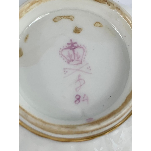 440 - An 18th century Crown Derby Puce mark cup and saucer. Circa 1795.