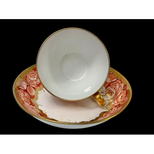 442 - An early 19th century Spode “Pluck & Dust” Rose pattern cup and saucer. Circa 1805.